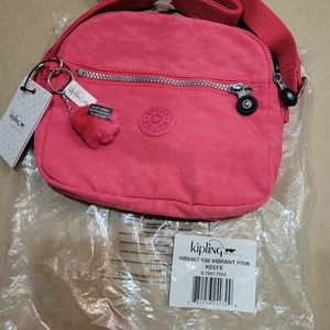 Brand new with tags. Kipling keefe crossbaody bag in vibrant pink